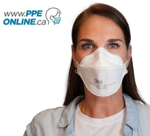 Load image into Gallery viewer, A women wearing a white 3M 9205 N95 mask with a blue nose clip and ear loops, laying flat on a white background
