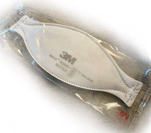 Load image into Gallery viewer, A white 3M 9205 N95 mask individually packaged with a blue nose clip and ear loops, laying flat on a white
