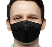 Load image into Gallery viewer, A black N95 mask with ear loops and a metal nose strip, on a man&#39;s face
